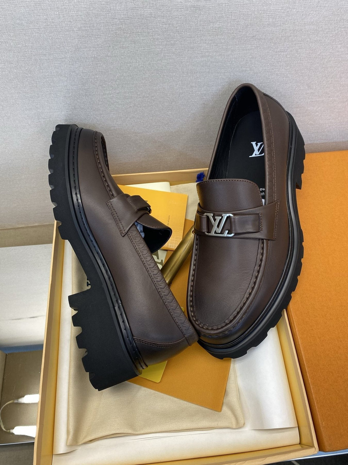 Louis Vuitton Men's Metal Logo Loafers